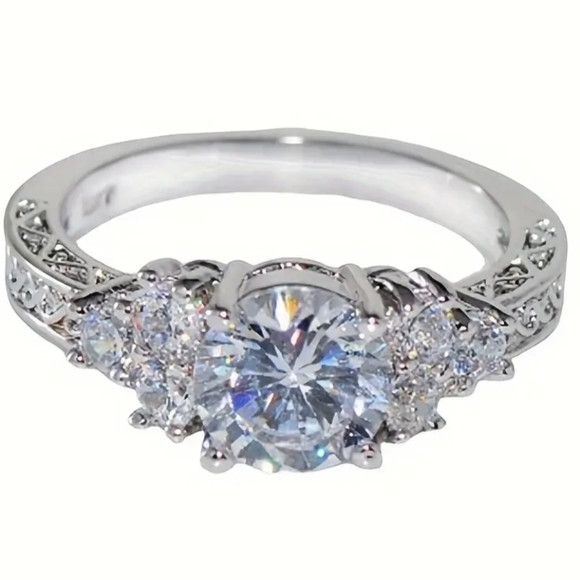 NEW silver tone circular zircon w/small inlaid zircons on the sides ring - Picture 2 of 10